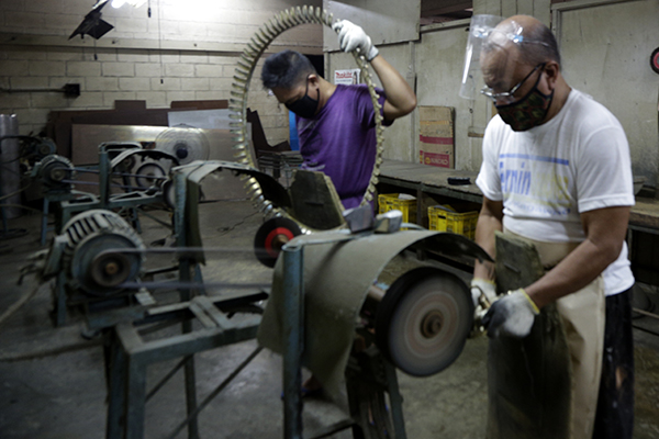 chandelier parts being buffed